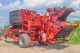 Semi-trailed potato harvester with lateral digging PT2